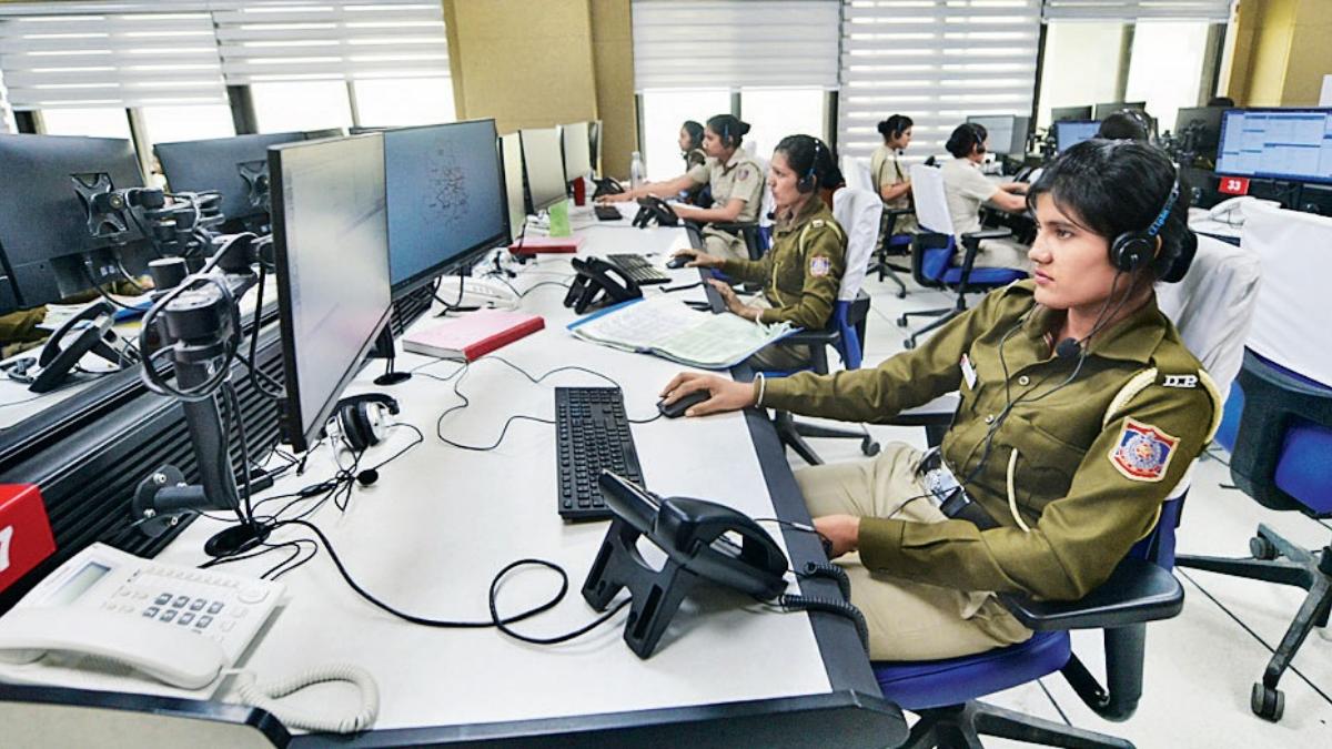 Delhi emergency 112 control room with large digital screens and call-takers