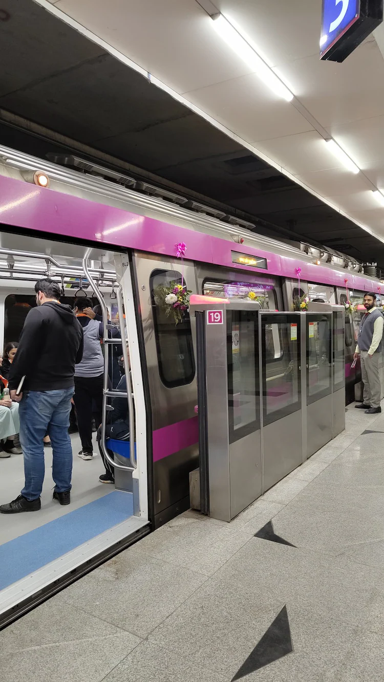 Delhi Metro train arriving at an elevated station, symbolising the Janakpuri West–Krishna Park Extension inauguration.