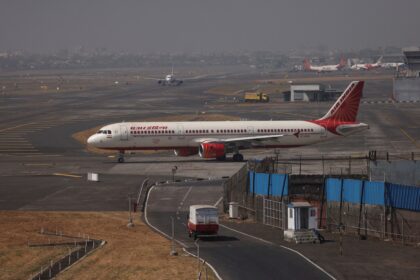 Air India jets on the apron as rising fuel costs force a hike in surcharges.