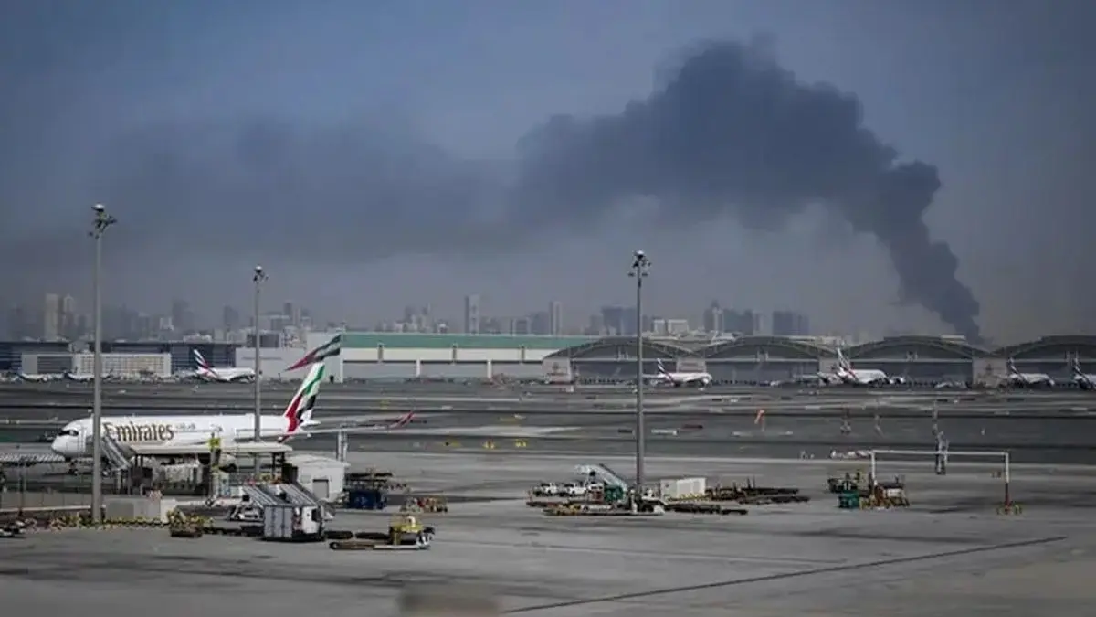 Emergency crews near Dubai International Airport after reported drone strike